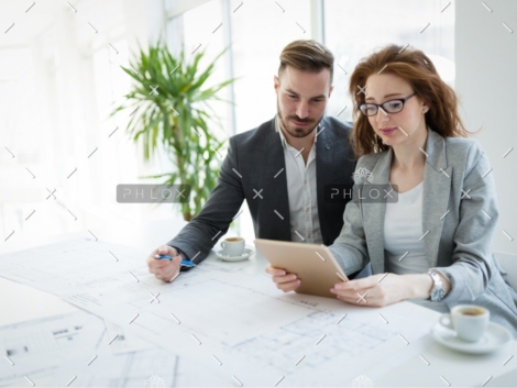 demo-attachment-2723-portrait-of-young-architect-woman-on-meeting-KFZCE3A